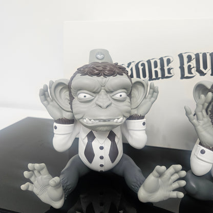 Close up of Ron English  "Hear No Evil" Monkey figure