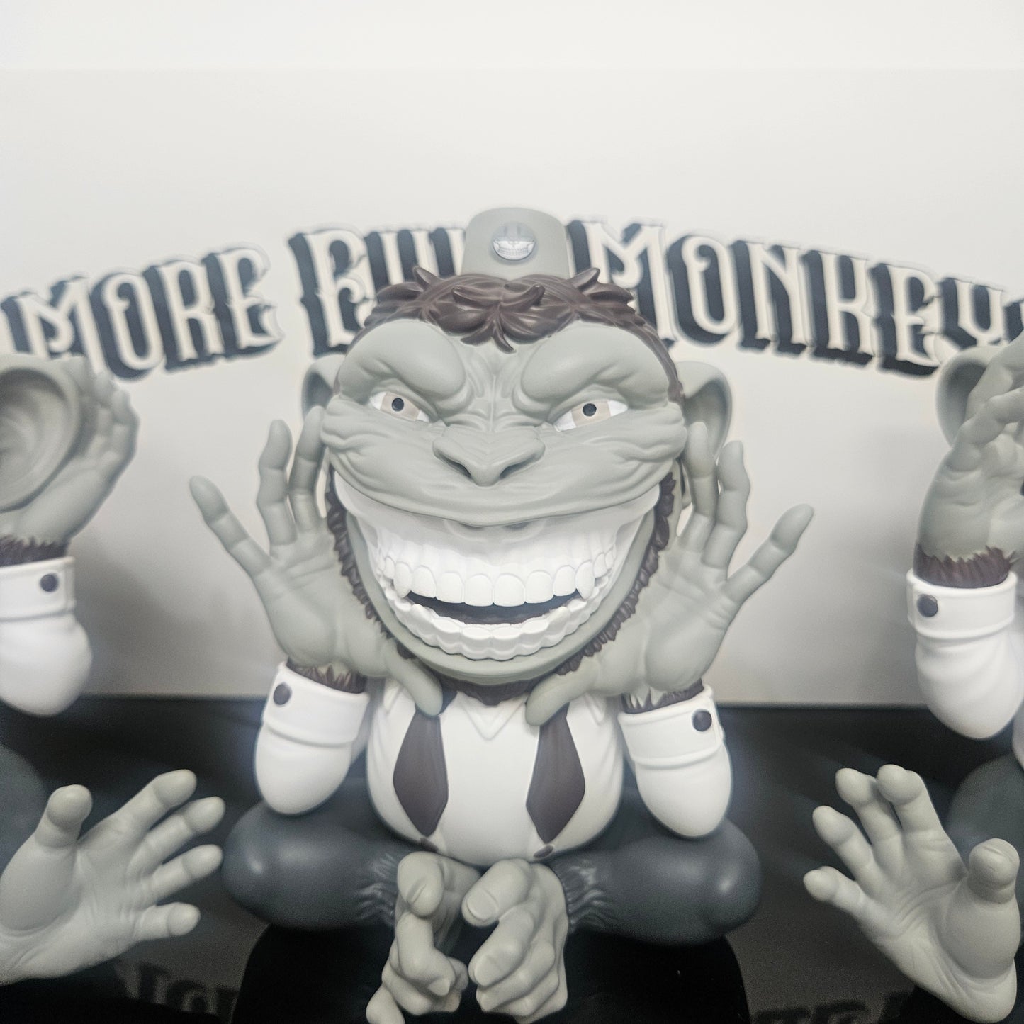 Close up of Ron English  "Speak No Evil" Monkey figure
